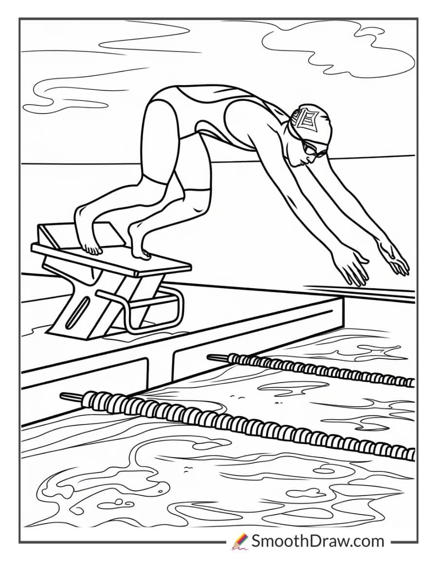 Competitive swimmer diving off the starting block