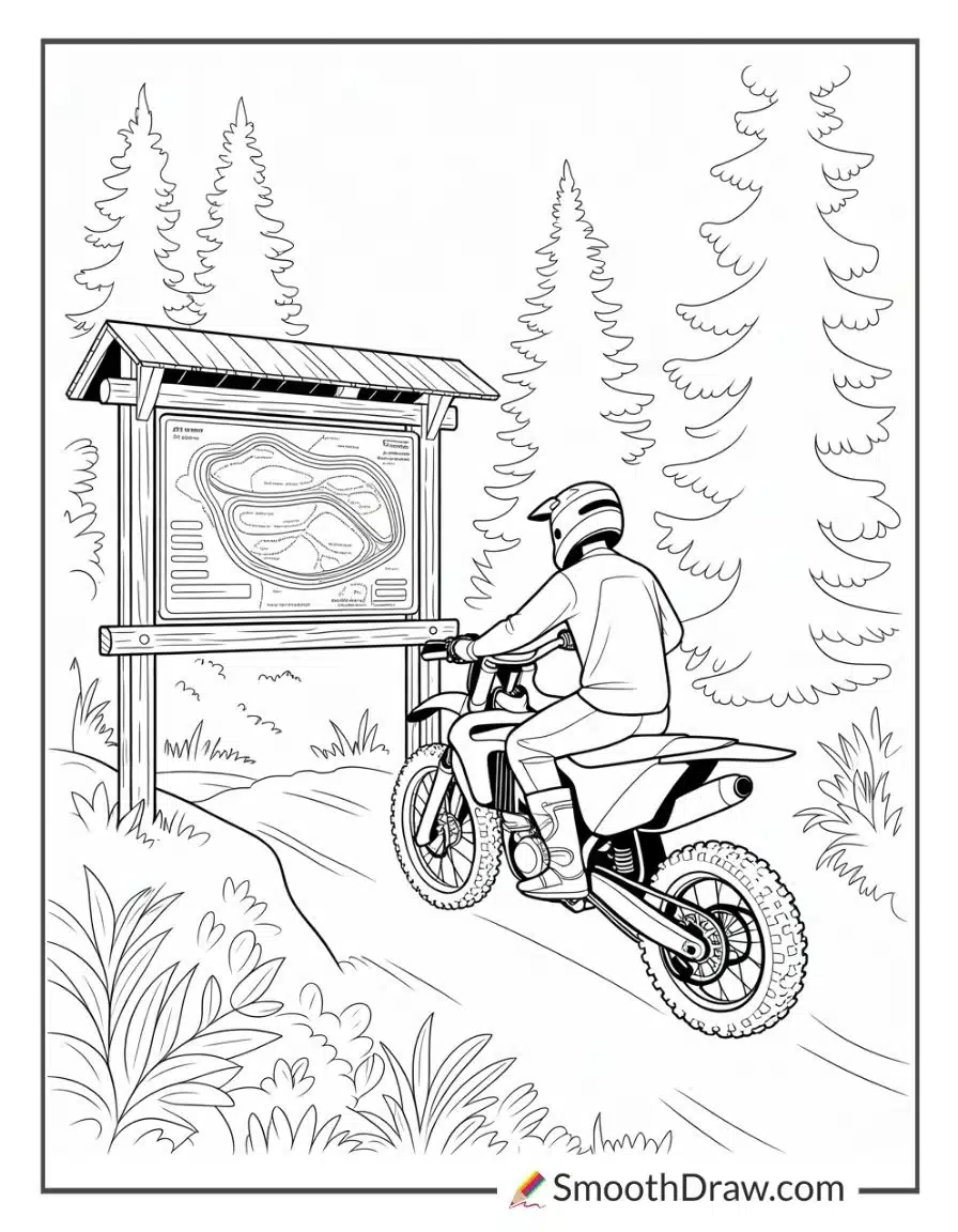 Rider following trail map sign