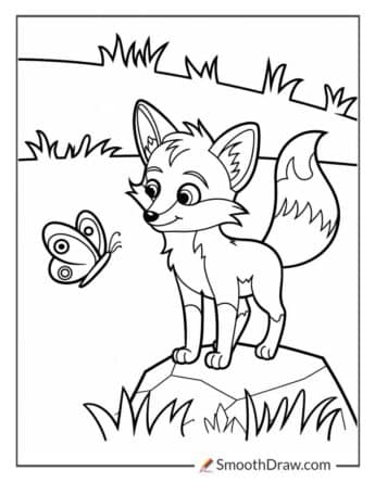 Young fox with butterfly